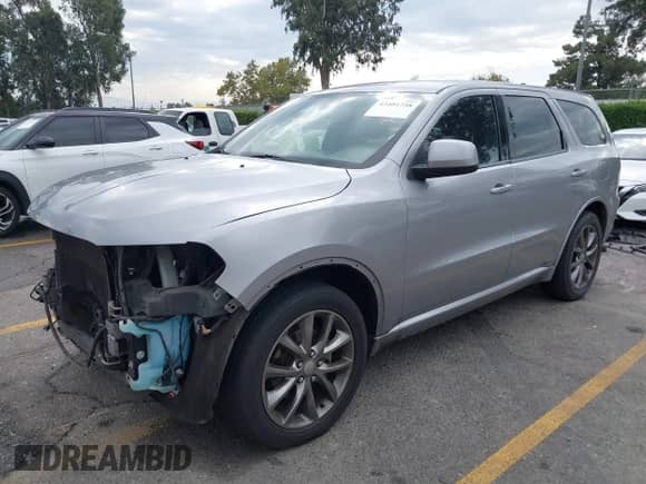 2014 Dodge Durango SXT with VIN 1C4RDHAG8EC523987, listed as a IAAI auction lot 43401258 with 190,306 mi miles and . Bid and sale history available at DreamBid. Image 18.
