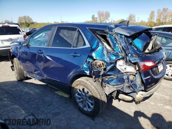 ✅ 2021 Chevrolet Equinox LT • VIN: 2GNAXUEV5M6104077 • Lot: 78921454. Listed on Copart with 69,834 mi. Free auction sales archive from the USA and detailed vehicle history report at DreamBid. Image 2.