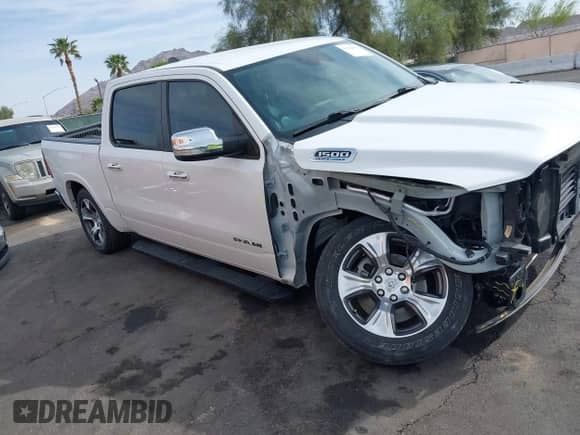 2022 Ram 1500 Laramie z VIN 1C6RREJTXNN357898, wystawiony jako IAAI lot #41966113 z przebiegiem 57 947 mil mil oraz . Historia ofert i sprzedaży dostępna na DreamBid. Obrazek 19.