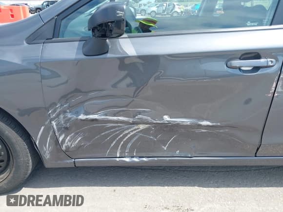 ✅ 2021 Subaru Impreza • VIN: 4S3GTAB66M3706956 • Lot: 42602130. Listed on IAAI with 26,244 mi. Free auction sales archive from the USA and detailed vehicle history report at DreamBid. Image 6.