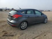 ✅ 2016 Ford Focus Titanium • VIN: 1FADP3N20GL249535 • Лот: 93452785. Опубликован ранее на Copart с пробегом 57 259 миль. Бесплатный доступ к архиву аукционных продаж из США и подробный отчёт об истории автомобиля на DreamBid. Изображение 3.