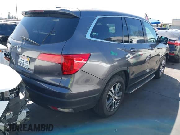 ✅ 2017 Honda Pilot EX-L • VIN: 5FNYF5H59HB030884 • Lot: 43118488. Listed on IAAI with 69,489 mi. Free auction sales archive from the USA and detailed vehicle history report at DreamBid. Image 4.