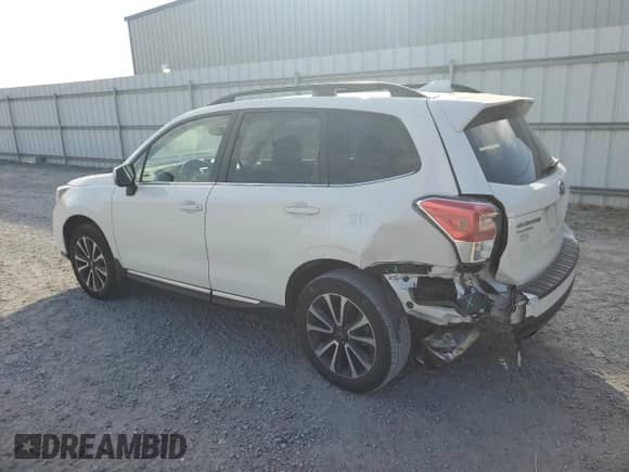 2018 Subaru Forester Touring z VIN JF2SJGWC9JH593863, wystawiony jako Copart lot #65283225 z przebiegiem 50 130 mil mil oraz Szkoda całkowita • Salvage title. Historia ofert i sprzedaży dostępna na DreamBid. Obrazek 2.
