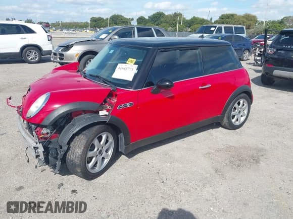 ✅ 2006 MINI Hardtop • VIN: WMWRC33526TK18176 • Lot: 41643771. Listed on IAAI with 115,778 mi. Free auction sales archive from the USA and detailed vehicle history report at DreamBid. Image 2.