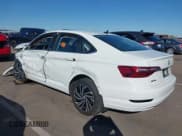 ✅ 2021 Volkswagen Jetta SEL • VIN: 3VWE57BU0MM048033 • Lot: 43396551. Wystawiony na IAAI z przebiegiem Nie podano. Bezpłatny archiwum sprzedaży aukcyjnych z USA i szczegółowy raport historii pojazdu na DreamBid. Zdjęcie 3.
