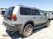 ✅ 2000 Mitsubishi Montero Sport LS • VIN: JA4LS31H3YP054032 • Lot: 57260655. Listed on Copart with Not provided. Free auction sales archive from the USA and detailed vehicle history report at DreamBid. Image 3.