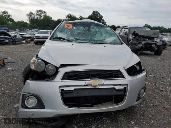 2012 Chevrolet Sonic LTZ with VIN 1G1JE5SH9C4125235, listed as a Copart auction lot 60902575 with 120,154 mi miles and Non repairable. Bid and sale history available at DreamBid. Image 5.