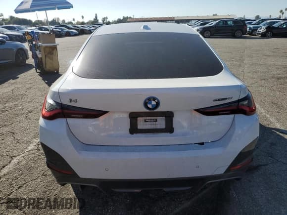 ✅ 2022 BMW i4 eDrive40 • VIN: WBY73AW00NFN10810 • Lot: 82780815. Listed on Copart with 59,444 mi. Free auction sales archive from the USA and detailed vehicle history report at DreamBid. Image 6.
