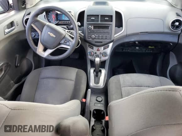 2014 Chevrolet Sonic LS с VIN 1G1JA6SH7E4182585, выставлен на аукционе Copart как лот 71152644 с пробегом 196 788 миль миль и Списание • Salvage title. История ставок и продаж доступна на DreamBid. Изображение 8.