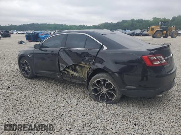 ✅ 2016 Ford Taurus SHO • VIN: 1FAHP2KTXGG155969 • Lot: 54431405. Listed on Copart with 124,040 mi. Free auction sales archive from the USA and detailed vehicle history report at DreamBid. Image 2.