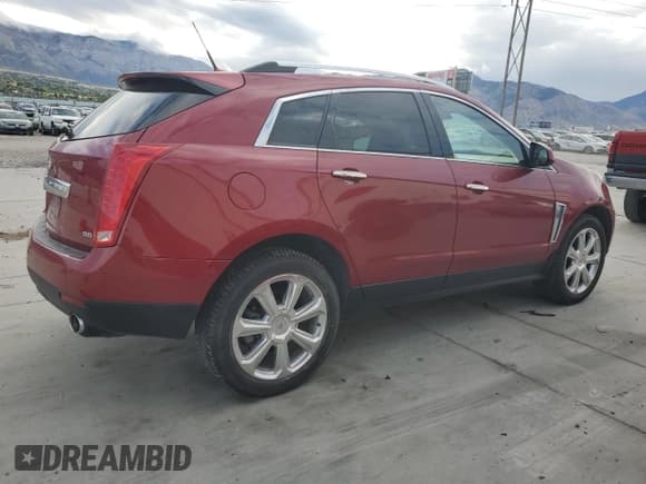 ✅ 2013 Cadillac SRX Premium Collection • VIN: 3GYFNJE34DS654383 • Lot: 84997955. Wystawiony na Copart z przebiegiem 121 842 mil. Bezpłatny archiwum sprzedaży aukcyjnych z USA i szczegółowy raport historii pojazdu na DreamBid. Zdjęcie 3.
