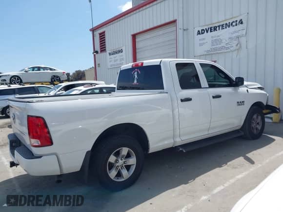 2018 Ram 1500 Tradesman z VIN 1C6RR6FG8JS166266, wystawiony jako IAAI lot #42128397 z przebiegiem 76 106 mil mil oraz . Historia ofert i sprzedaży dostępna na DreamBid. Obrazek 13.