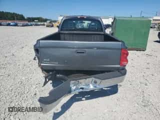 2006 Dodge Dakota SLT с VIN 1D7HE42K96S714075, выставлен на аукционе Copart как лот 75673964 с пробегом 208 571 миль миль и Списание • Salvage title. История ставок и продаж доступна на DreamBid. Изображение 6.