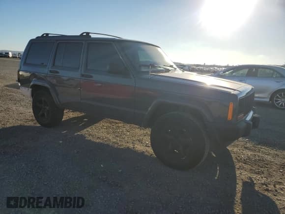 ✅ 1999 Jeep Cherokee Sport • VIN: 1J4FT68S6XL562840 • Lot: 81899585. Wystawiony na Copart z przebiegiem 215 276 mil. Bezpłatny archiwum sprzedaży aukcyjnych z USA i szczegółowy raport historii pojazdu na DreamBid. Zdjęcie 4.