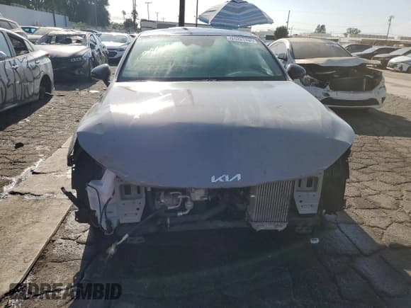 ✅ 2022 Kia K5 GT • VIN: 5XXG44J86NG134306 • Лот: 70328825. Опубликован ранее на Copart с пробегом 34 194 миль. Бесплатный доступ к архиву аукционных продаж из США и подробный отчёт об истории автомобиля на DreamBid. Изображение 5.