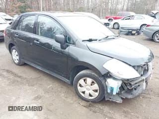 ✅ 2009 Nissan Versa 1.6 • VIN: 3N1CC11EX9L458233 • Lot: 43754363. Listed on IAAI with 148,298 mi. Free auction sales archive from the USA and detailed vehicle history report at DreamBid. Image 1.