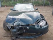 ✅ 1999 Mazda MX-5 Miata • VIN: JM1NB3531X0105029 • Lot: 42083930. Listed on IAAI with 186,885 mi. Free auction sales archive from the USA and detailed vehicle history report at DreamBid. Image 12.