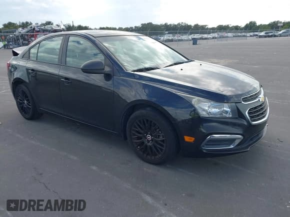 ✅ 2015 Chevrolet Cruze LS • VIN: 1G1PA5SH1F7286946 • Lot: 43555651. Listed on IAAI with 85,191 mi. Free auction sales archive from the USA and detailed vehicle history report at DreamBid. Image 1.