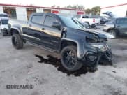 ✅ 2021 Chevrolet Colorado 4WD Work Truck • VIN: 1GCGTBEN6M1157490 • Lot: 43516980. Wystawiony na IAAI z przebiegiem 79 094 mil. Bezpłatny archiwum sprzedaży aukcyjnych z USA i szczegółowy raport historii pojazdu na DreamBid. Zdjęcie 1.