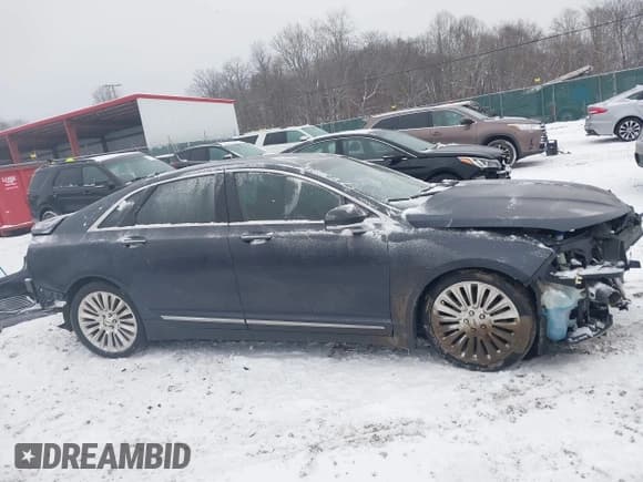 ✅ 2013 Lincoln MKZ • VIN: 3LN6L2GK0DR825820 • Lot: 41603721. Wystawiony na IAAI z przebiegiem 110 837 mil. Bezpłatny archiwum sprzedaży aukcyjnych z USA i szczegółowy raport historii pojazdu na DreamBid. Zdjęcie 14.