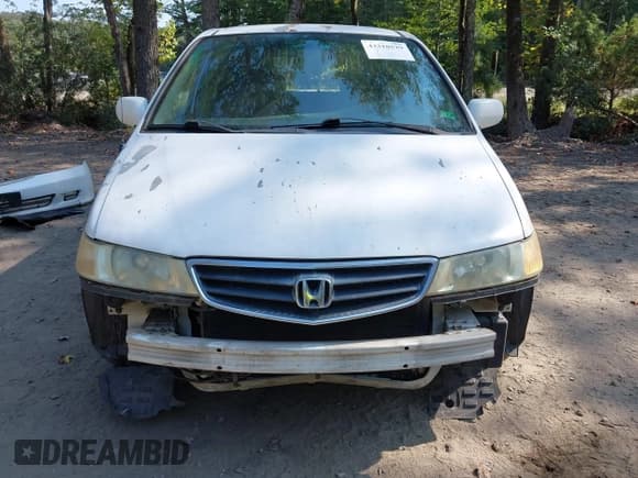 ✅ 2004 Honda Odyssey EX-L • VIN: 5FNRL18924B078634 • Lot: 43310529. Listed on IAAI with 249,022 mi. Free auction sales archive from the USA and detailed vehicle history report at DreamBid. Image 6.
