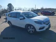 ✅ 2017 Honda Pilot EX-L • VIN: 5FNYF6H5XHB098584 • Lot: 43664045. Listed on IAAI with 119,767 mi. Free auction sales archive from the USA and detailed vehicle history report at DreamBid. Image 1.