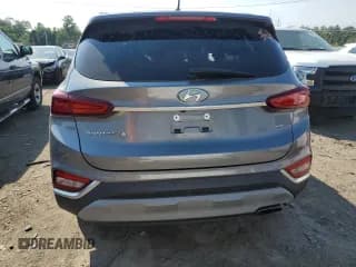✅ 2019 Hyundai Santa Fe SE • VIN: 5NMS2CAD5KH003033 • Lot: 59199804. Wystawiony na Copart z przebiegiem Nie podano. Bezpłatny archiwum sprzedaży aukcyjnych z USA i szczegółowy raport historii pojazdu na DreamBid. Zdjęcie 6.
