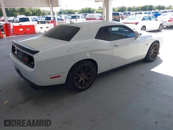 ✅ 2016 Dodge Challenger SRT Hellcat • VIN: 2C3CDZC99GH200224 • Lot: 43442618. Wystawiony na IAAI z przebiegiem 56 715 mil. Bezpłatny archiwum sprzedaży aukcyjnych z USA i szczegółowy raport historii pojazdu na DreamBid. Zdjęcie 4.