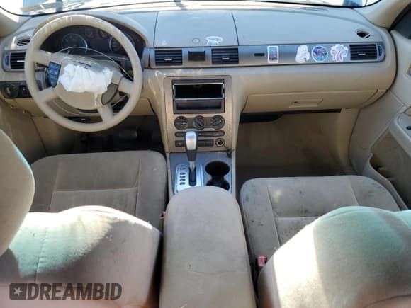 ✅ 2005 Ford Five Hundred SE • VIN: 1FAFP23195G113701 • Lot: 90420375. Wystawiony na Copart z przebiegiem 140 281 mil. Bezpłatny archiwum sprzedaży aukcyjnych z USA i szczegółowy raport historii pojazdu na DreamBid. Zdjęcie 8.