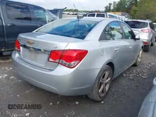 2015 Chevrolet Cruze LT z VIN 1G1PE5SB9F7200332, wystawiony jako IAAI lot #43403040 z przebiegiem 154 776 mil mil oraz . Historia ofert i sprzedaży dostępna na DreamBid. Obrazek 4.