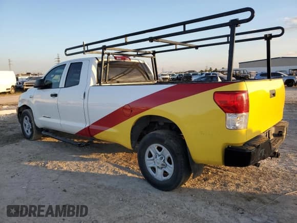 ✅ 2012 Toyota Tundra SR • VIN: 5TFTY5F12CX007367 • Lot: 79122864. Listed on Copart with 162,623 mi. Free auction sales archive from the USA and detailed vehicle history report at DreamBid. Image 2.