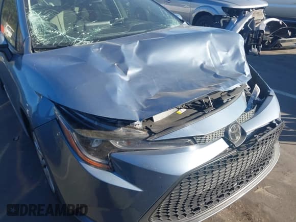 ✅ 2021 Toyota Corolla LE • VIN: JTDEPMAE5MJ124980 • Lot: 43506447. Listed on IAAI with 65,485 mi. Free auction sales archive from the USA and detailed vehicle history report at DreamBid. Image 18.