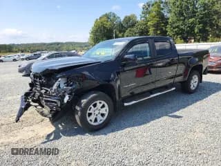 ✅ 2021 Chevrolet Colorado 4WD LT • VIN: 1GCGTCEN1M1182030 • Лот: 80992305. Опубликован ранее на Copart с пробегом 90 499 миль. Бесплатный доступ к архиву аукционных продаж из США и подробный отчёт об истории автомобиля на DreamBid. Изображение 1.