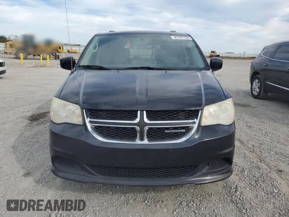2012 Dodge Grand Caravan SXT z VIN 2C4RDGCG9CR198584, wystawiony jako Copart lot #87287765 z przebiegiem 189 694 mil mil oraz Szkoda całkowita • Salvage title. Historia ofert i sprzedaży dostępna na DreamBid. Obrazek 5.