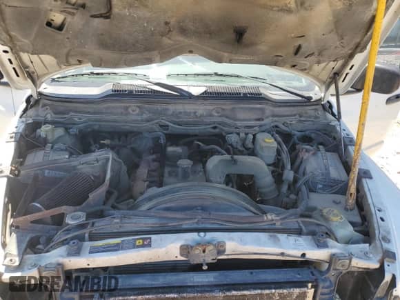 2005 Dodge 3500 SLT z VIN 3D7LS38C45G792511, wystawiony jako Copart lot #52987515 z przebiegiem 353 409 mil mil oraz Szkoda całkowita • Salvage title. Historia ofert i sprzedaży dostępna na DreamBid. Obrazek 11.