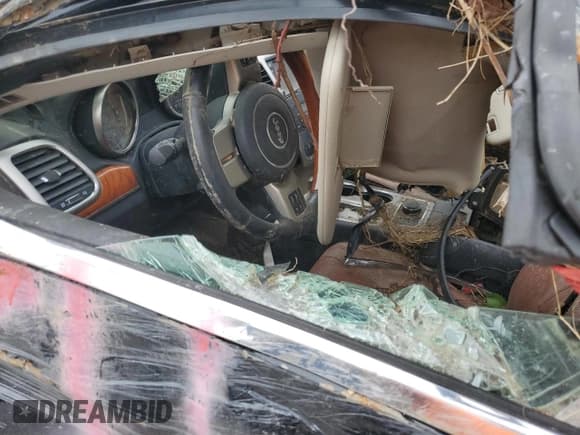 ✅ 2012 Jeep Grand Cherokee Overland • VIN: 1C4RJFCG8CC245390 • Lot: 67200305. Listed on Copart with Not provided. Free auction sales archive from the USA and detailed vehicle history report at DreamBid. Image 8.