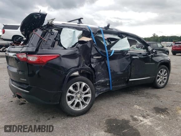 ✅ 2021 Chevrolet Traverse Premier • VIN: 1GNERKKW8MJ178027 • Lot: 64419784. Wystawiony na Copart z przebiegiem 58 921 mil. Bezpłatny archiwum sprzedaży aukcyjnych z USA i szczegółowy raport historii pojazdu na DreamBid. Zdjęcie 3.