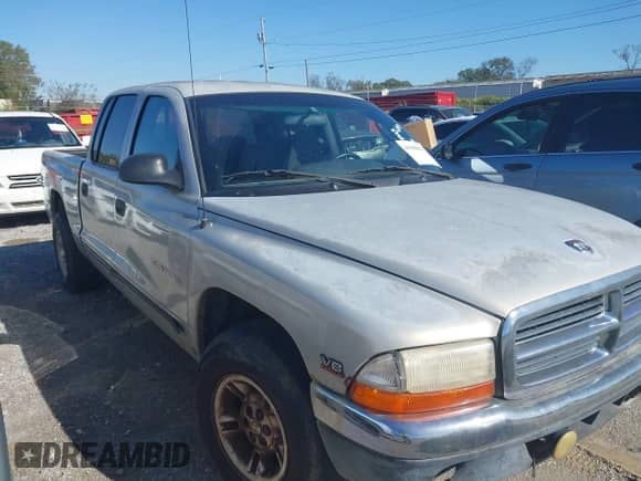 ✅ 2000 Dodge Dakota Sport • VIN: 1B7GL2AN6YS671636 • Лот: 43508621. Размещён на IAAI с пробегом 243 999 миль миль. Получите бесплатный доступ к архиву аукционных продаж из США и посмотрите подробный отчёт об истории автомобиля на DreamBid. Изображение 1.