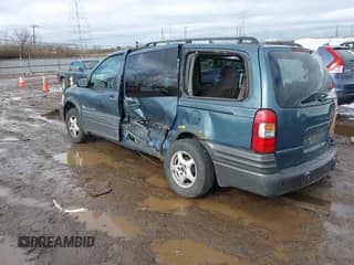 ✅ 2004 Pontiac Montana 1SA • VIN: 1GMDX03E74D110817 • Lot: 41465277. Wystawiony na IAAI z przebiegiem 263 180 mil. Bezpłatny archiwum sprzedaży aukcyjnych z USA i szczegółowy raport historii pojazdu na DreamBid. Zdjęcie 3.