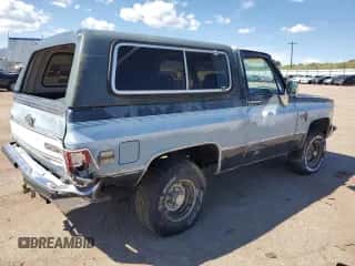 1987 Chevrolet Blazer z VIN 1GNEV18K7HF180306, wystawiony jako Copart lot #80914465 z przebiegiem 455 897 mil mil oraz Nie do naprawy • Non repairable. Historia ofert i sprzedaży dostępna na DreamBid. Obrazek 3.
