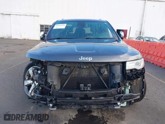 ✅ 2015 Jeep Grand Cherokee Overland • VIN: 1C4RJFCG3FC697994 • Lot: 40526924. Listed on IAAI with 199,275 mi. Free auction sales archive from the USA and detailed vehicle history report at DreamBid. Image 12.