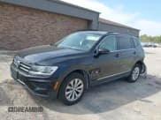 ✅ 2018 Volkswagen Tiguan SEL • VIN: 3VV2B7AX0JM084778 • Лот: 43200447. Опубликован ранее на IAAI с пробегом 77 889 миль. Бесплатный доступ к архиву аукционных продаж из США и подробный отчёт об истории автомобиля на DreamBid. Изображение 2.