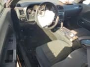 ✅ 2014 Dodge Challenger SXT • VIN: 2C3CDYAG6EH184864 • Лот: 85660624. Опубликован ранее на Copart с пробегом 105 204 миль. Бесплатный доступ к архиву аукционных продаж из США и подробный отчёт об истории автомобиля на DreamBid. Изображение 8.