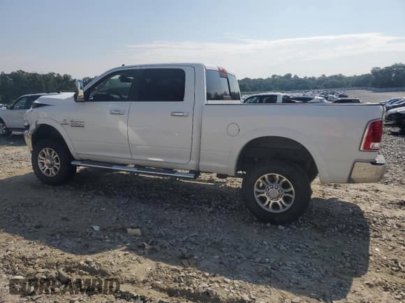 ✅ 2016 Ram 2500 Laramie • VIN: 3C6UR5FL3GG284775 • Lot: 69557275. Wystawiony na Copart z przebiegiem 216 176 mil. Bezpłatny archiwum sprzedaży aukcyjnych z USA i szczegółowy raport historii pojazdu na DreamBid. Zdjęcie 2.