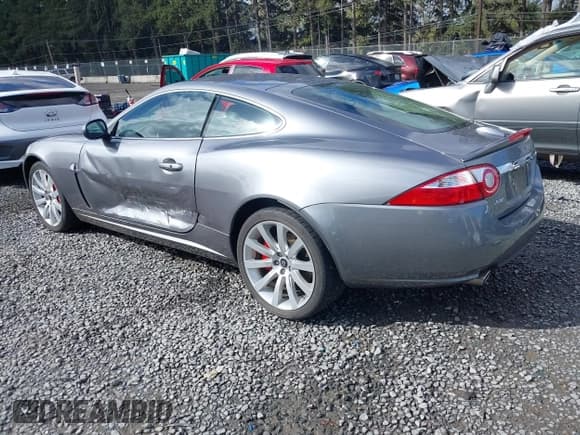 ✅ 2007 Jaguar XK • VIN: SAJWA43B675B17854 • Lot: 42003478. Listed on IAAI with 64,149 mi. Free auction sales archive from the USA and detailed vehicle history report at DreamBid. Image 3.