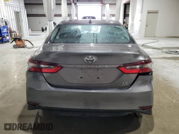 2023 Toyota Camry LE с VIN 4T1C11BK7PU097260, выставлен на аукционе Copart как лот 67957575 с пробегом 21 092 миль миль и Списание • Salvage title. История ставок и продаж доступна на DreamBid. Изображение 6.