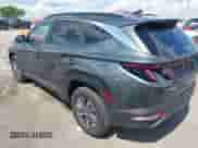 2023 Hyundai Tucson Blue z VIN KM8JBCA13PU117156, wystawiony jako IAAI lot #42376110 z przebiegiem 68 919 mil mil oraz . Historia ofert i sprzedaży dostępna na DreamBid. Obrazek 3.