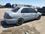 ✅ 2005 Mitsubishi Lancer ES • VIN: JA3AJ26E65U054420 • Lot: 52206935. Listed on Copart with 187,277 mi. Free auction sales archive from the USA and detailed vehicle history report at DreamBid. Image 3.