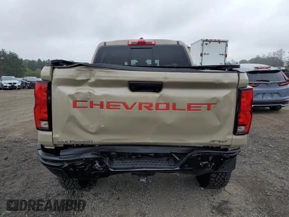 ✅ 2023 Chevrolet Colorado 4WD ZR2 • VIN: 1GCPTFEK6P1212067 • Лот: 68128724. Опубликован ранее на Copart с пробегом 12 859 миль. Бесплатный доступ к архиву аукционных продаж из США и подробный отчёт об истории автомобиля на DreamBid. Изображение 6.