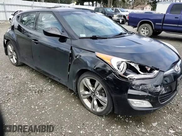 2013 Hyundai Veloster w/Gray Int z VIN KMHTC6AD5DU111338, wystawiony jako Copart lot #51661435 z przebiegiem 55 560 mil mil oraz Szkoda całkowita • Salvage title. Historia ofert i sprzedaży dostępna na DreamBid. Obrazek 10.